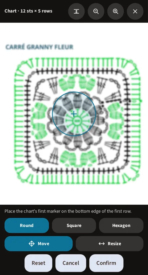 The same granny alignment assistant, the boundary declared round this time: the round loupe, marked with the same cross, circling the central flower of the blurred-stitch square, the Round, Square and Hexagon buttons (Round active), then Move, active as well, Resize, and at the bottom Reset, Cancel and Confirm